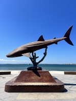 The impressive Aleta del Tiburón sculpture near the waterfront.