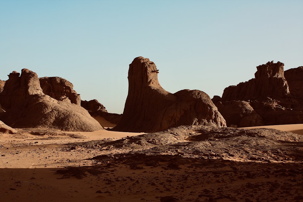 a desert landscape with large rocks