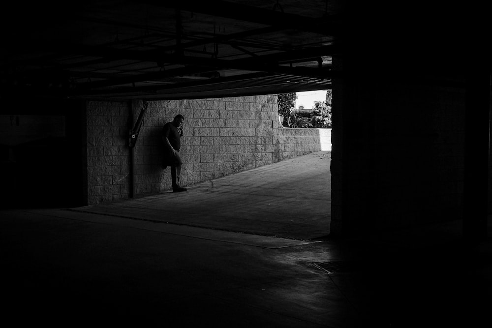 a person standing in a dark room