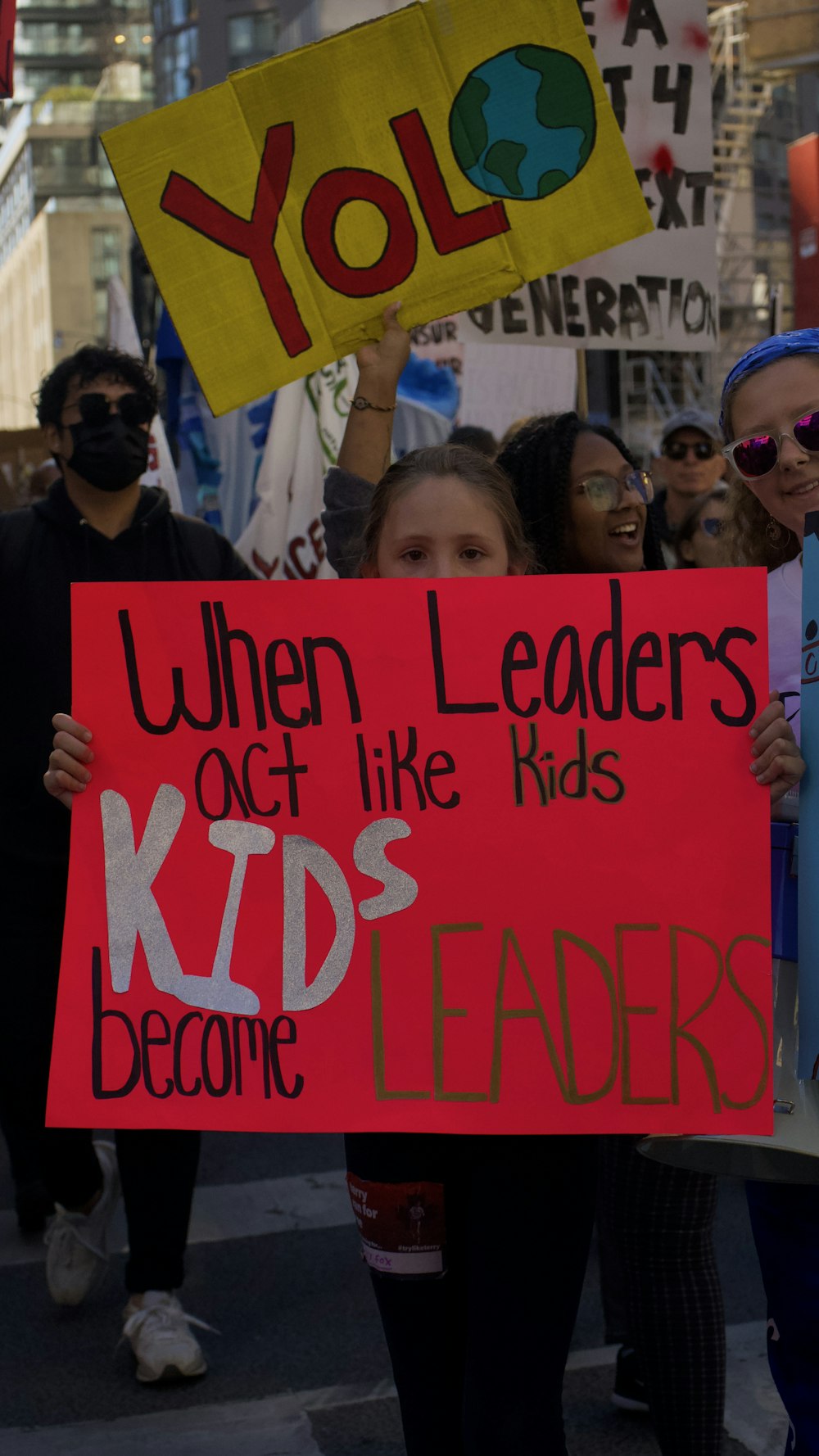 a group of people holding signs