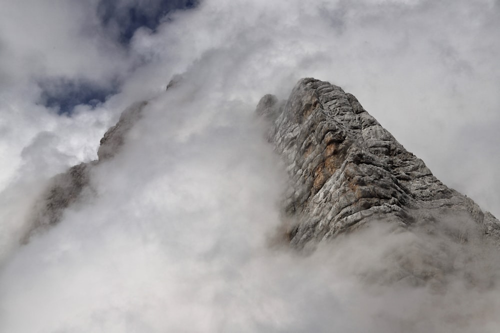 a large rock with smoke coming out of it