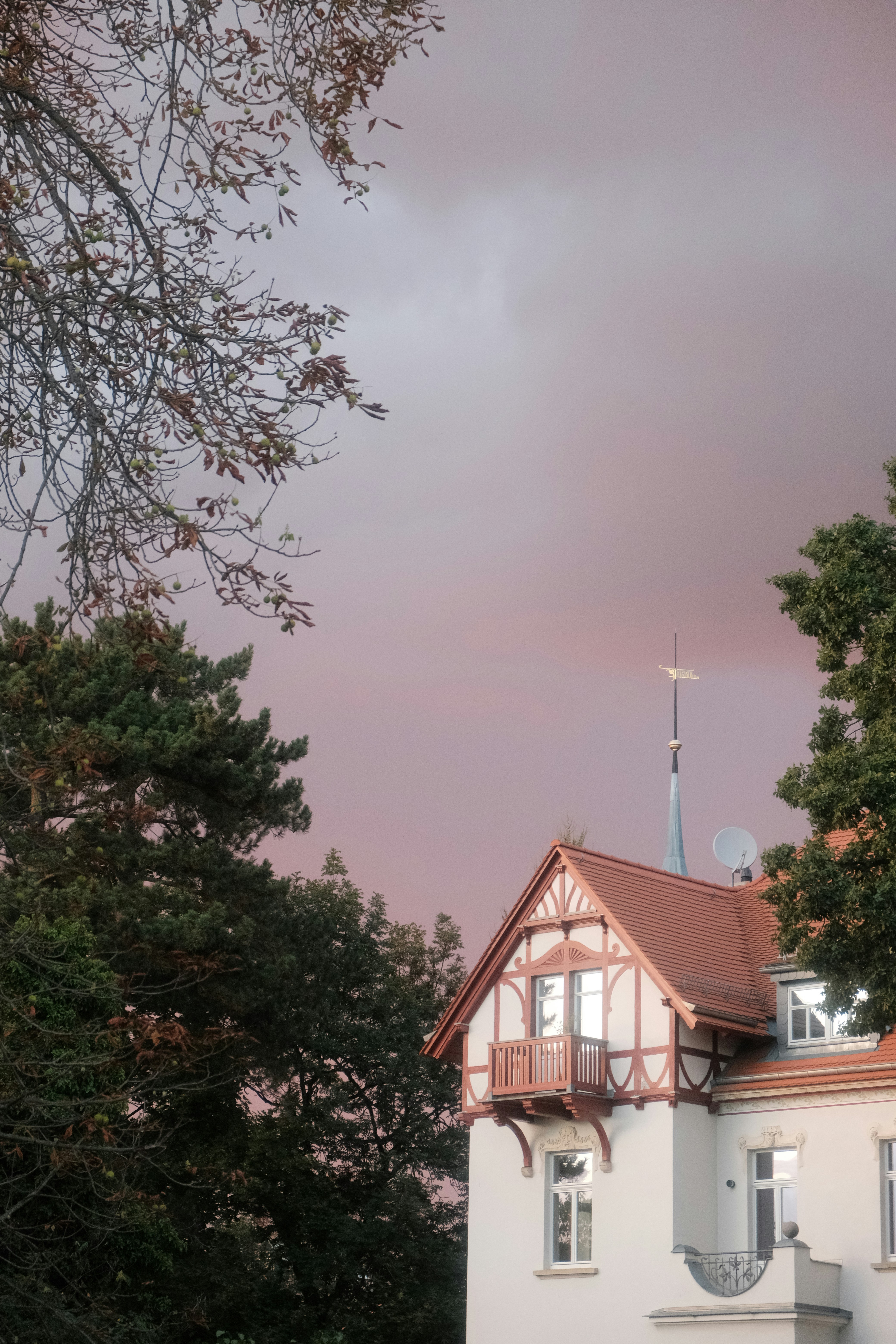 a building with a tower in the background