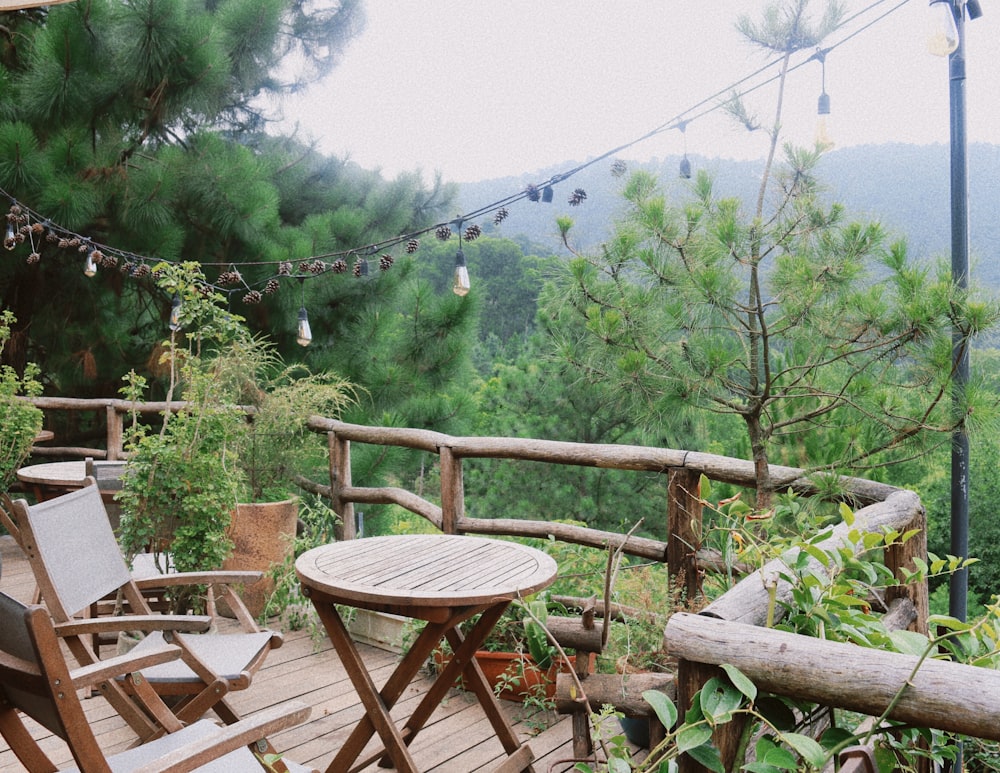 a table and chairs on a deck