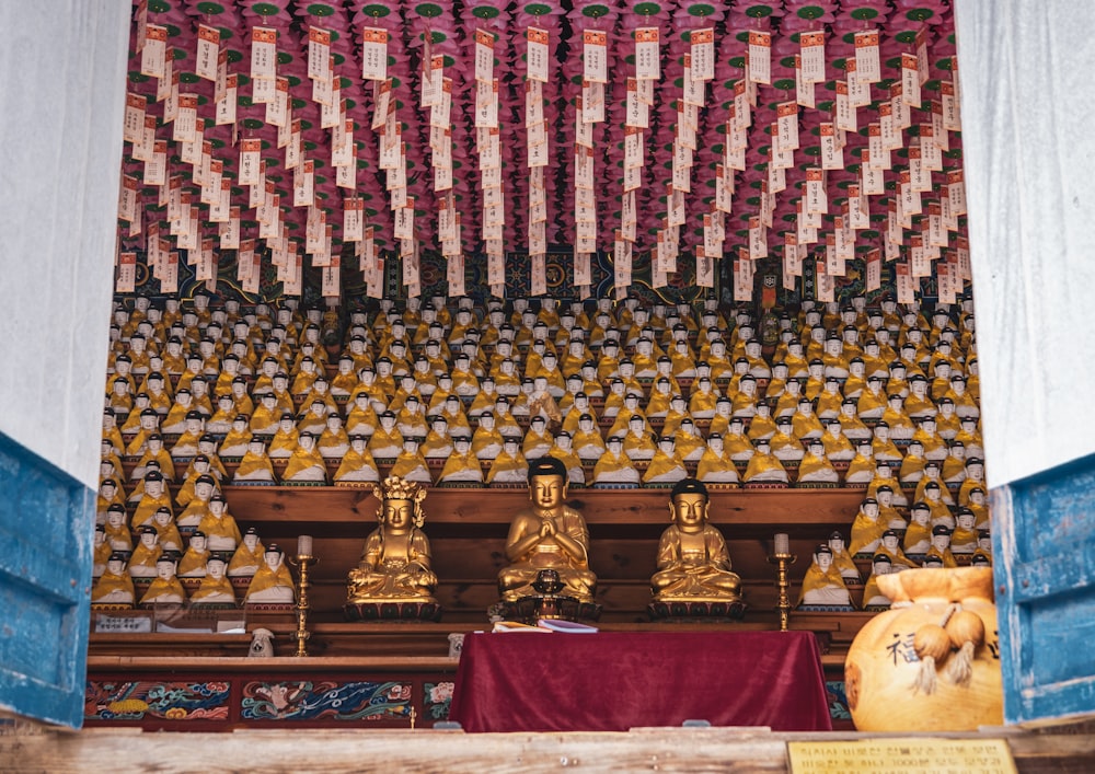 a group of statues in a room