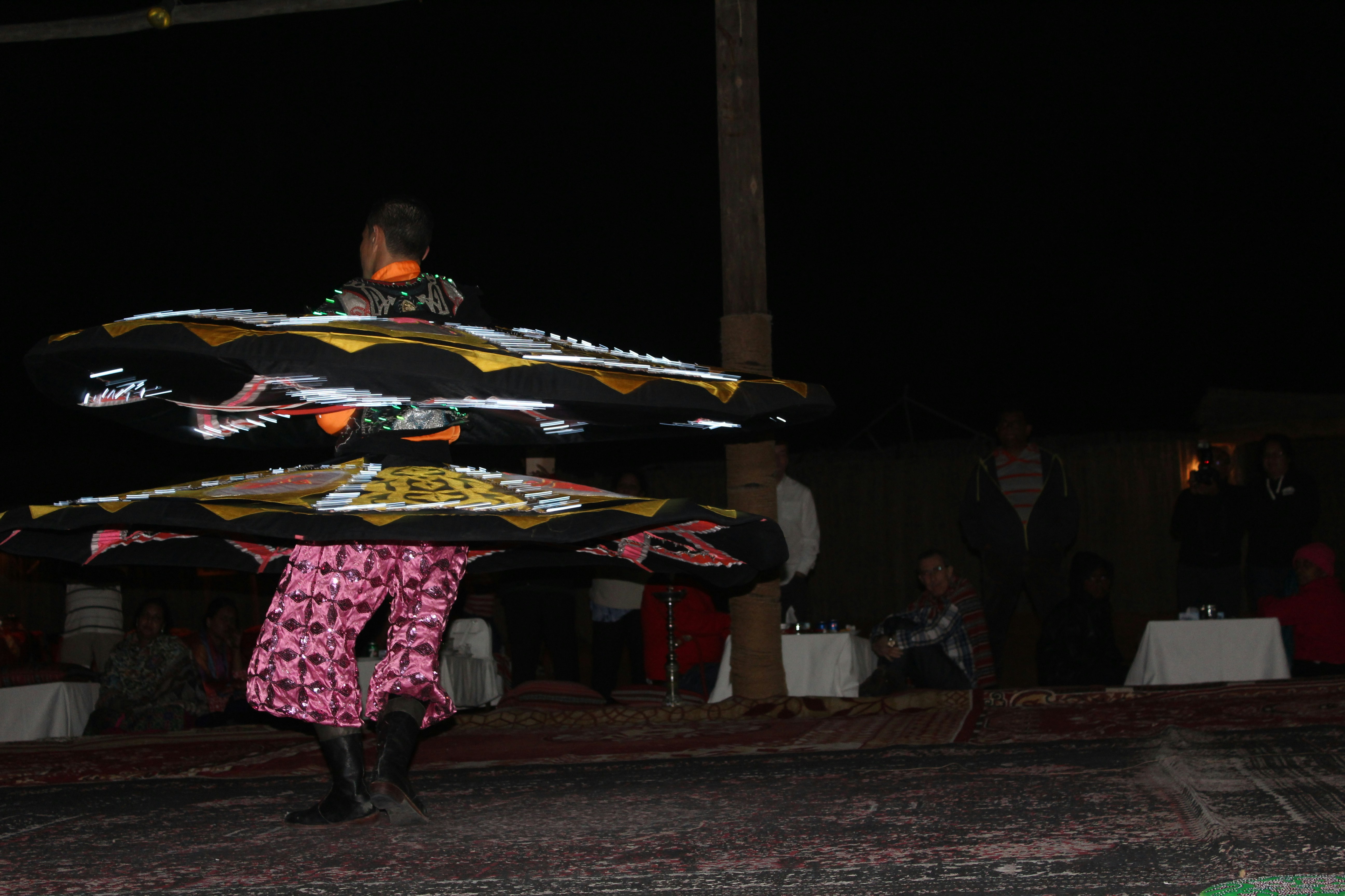 a person holding a large umbrella