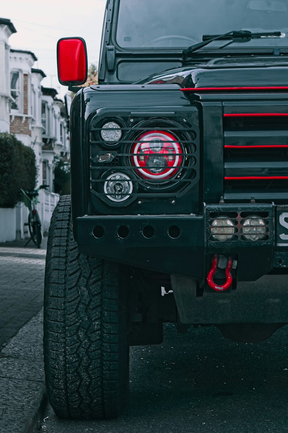 a black truck with large tires