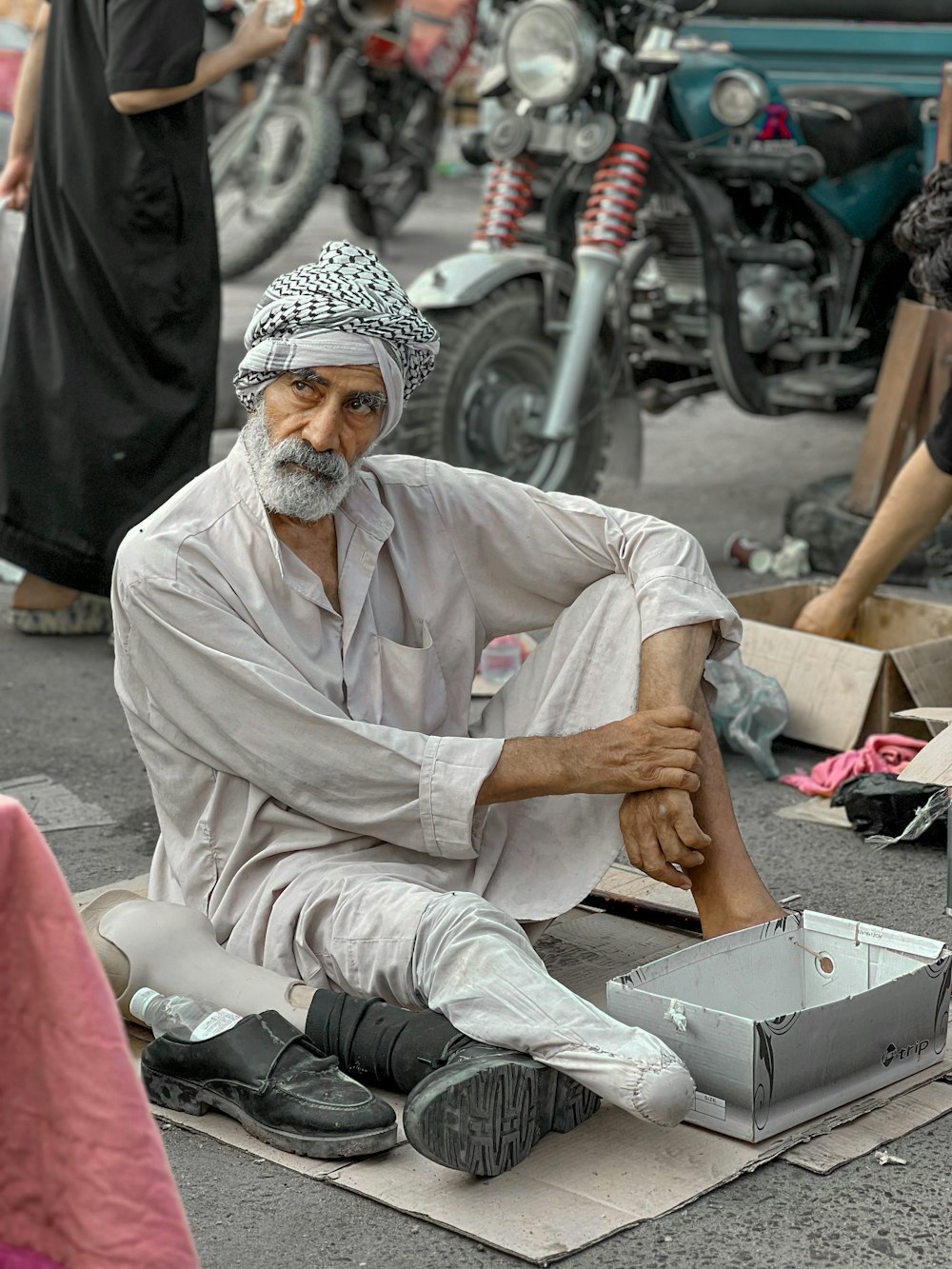 a person sitting on the ground