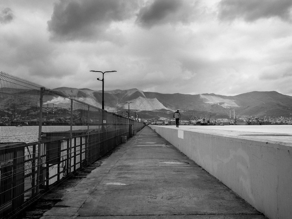 a person walking on a bridge