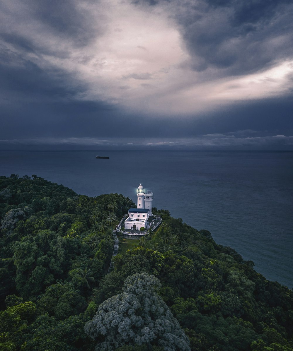 a lighthouse on a hill