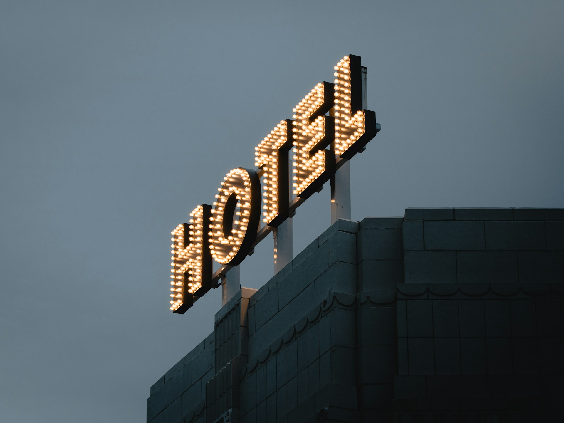 a large tower with a sign on top