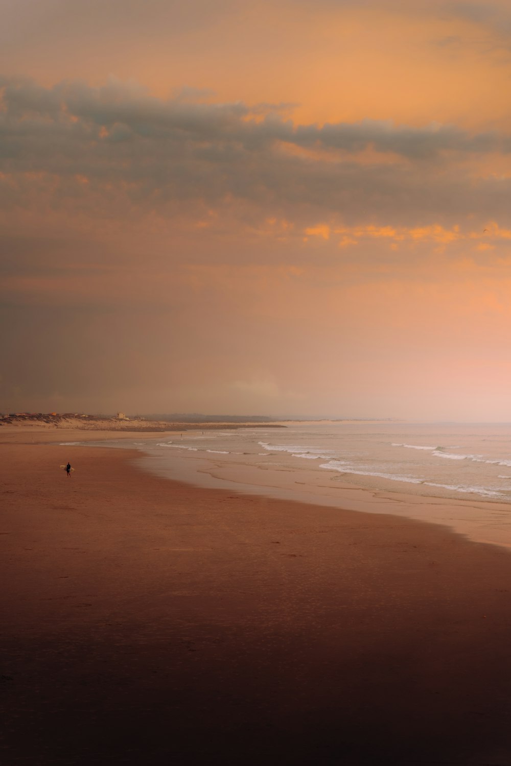 a person walking on a beach