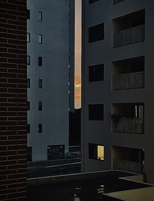 Front view of the apartment building at sunset