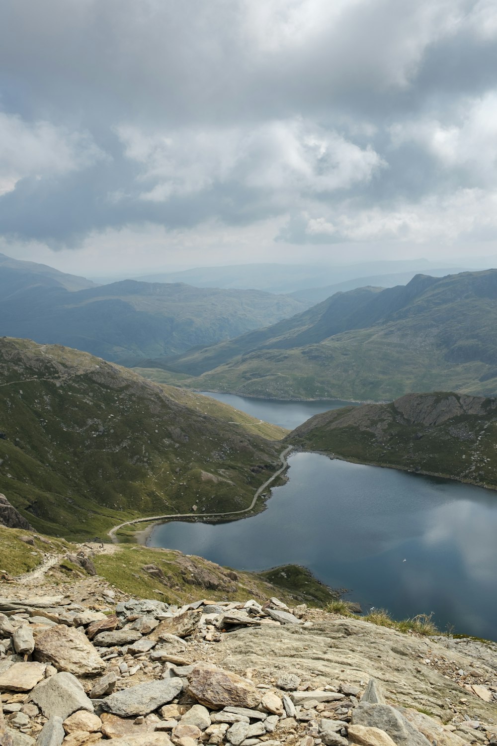 a lake surrounded by mountains