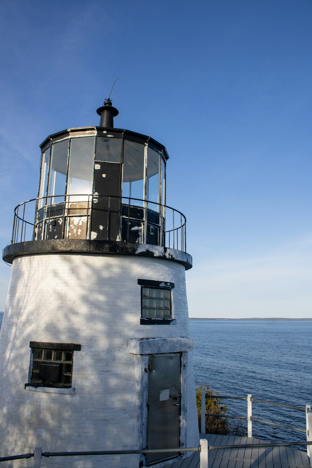 a lighthouse on a pier