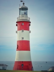 a lighthouse on a beach