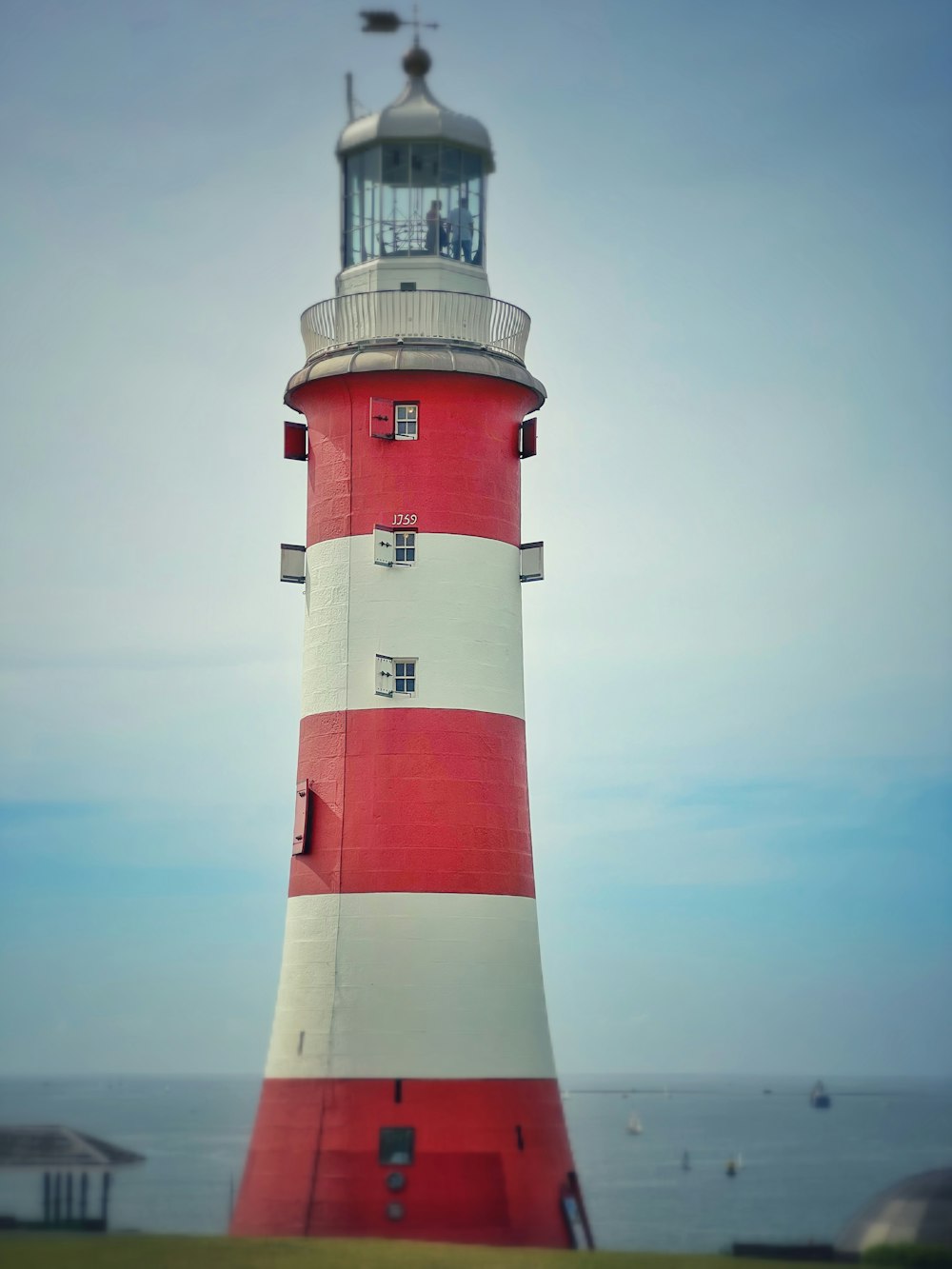 a lighthouse on a beach