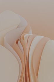 Abstract composition with smooth, flowing forms resembling layered paper or fabric. The shapes are organic, overlapping, and create a sense of depth. The color palette consists of soft, muted tones.