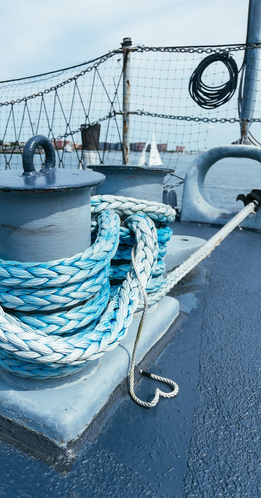 a boat with a blue tarp