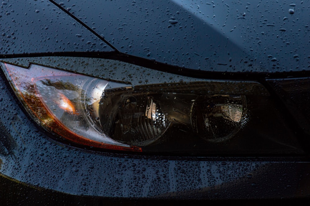 a close up of a car's headlight