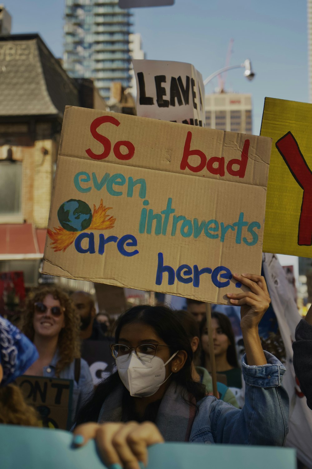 a group of people holding signs