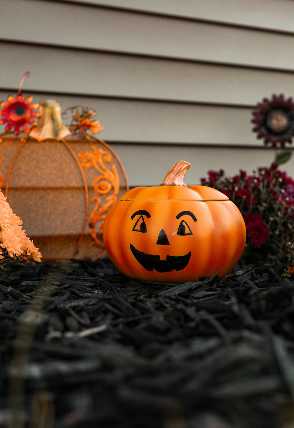 carved pumpkins with faces carved into them