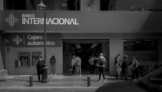 a group of people standing outside a building