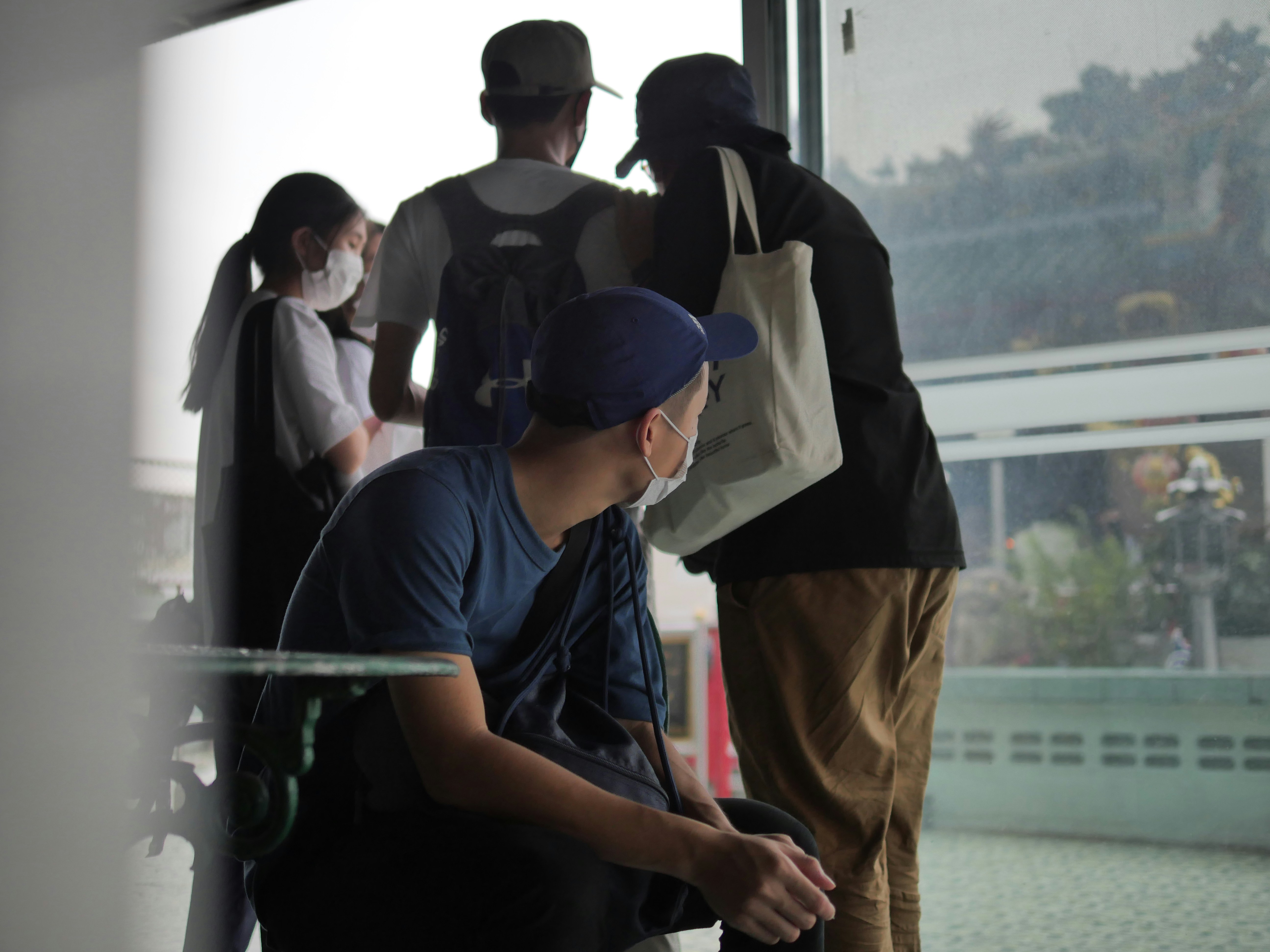 a group of people standing outside