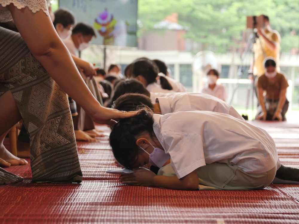 a group of people doing yoga