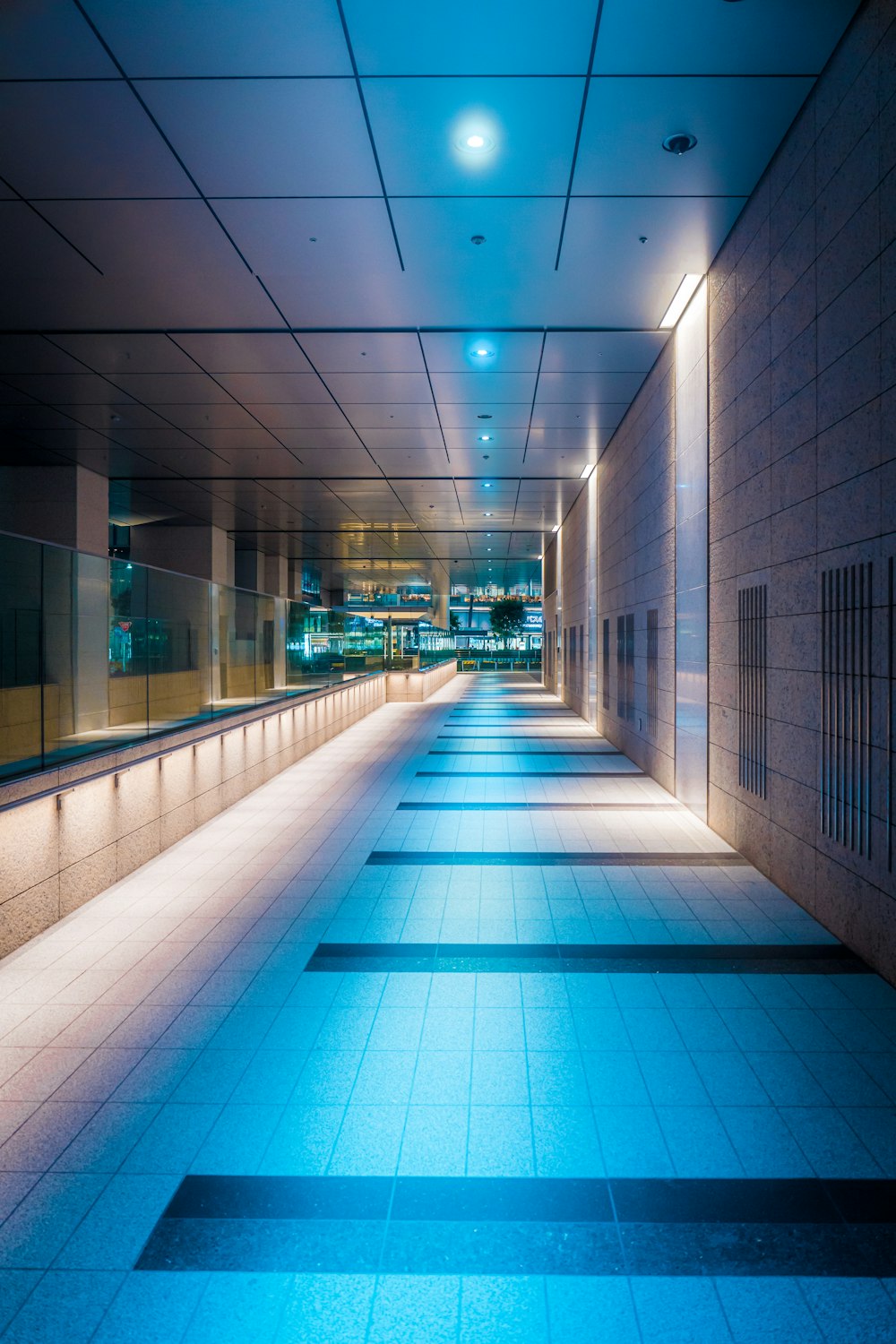 a long hallway with a tile floor