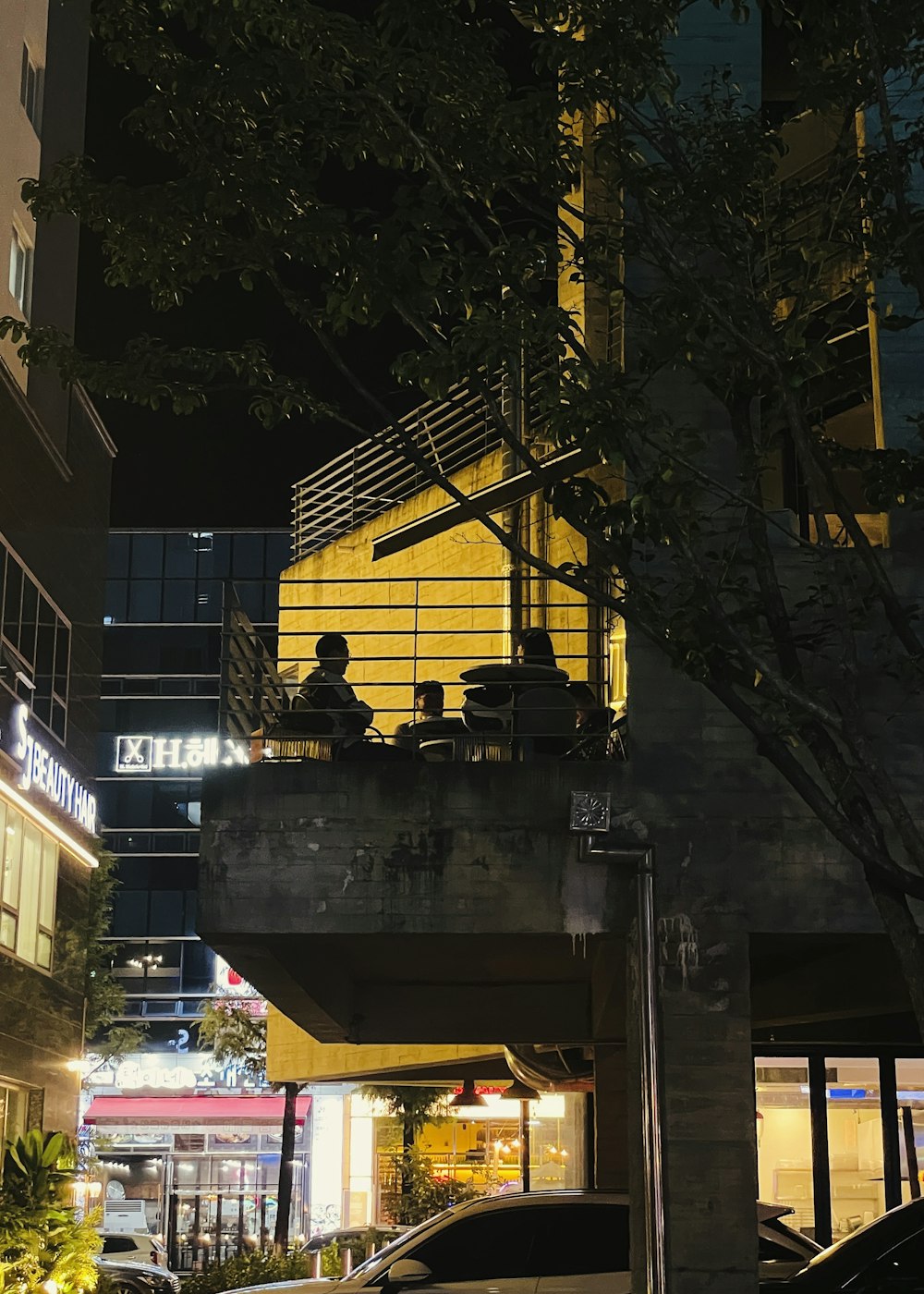 a building with a large yellow sign