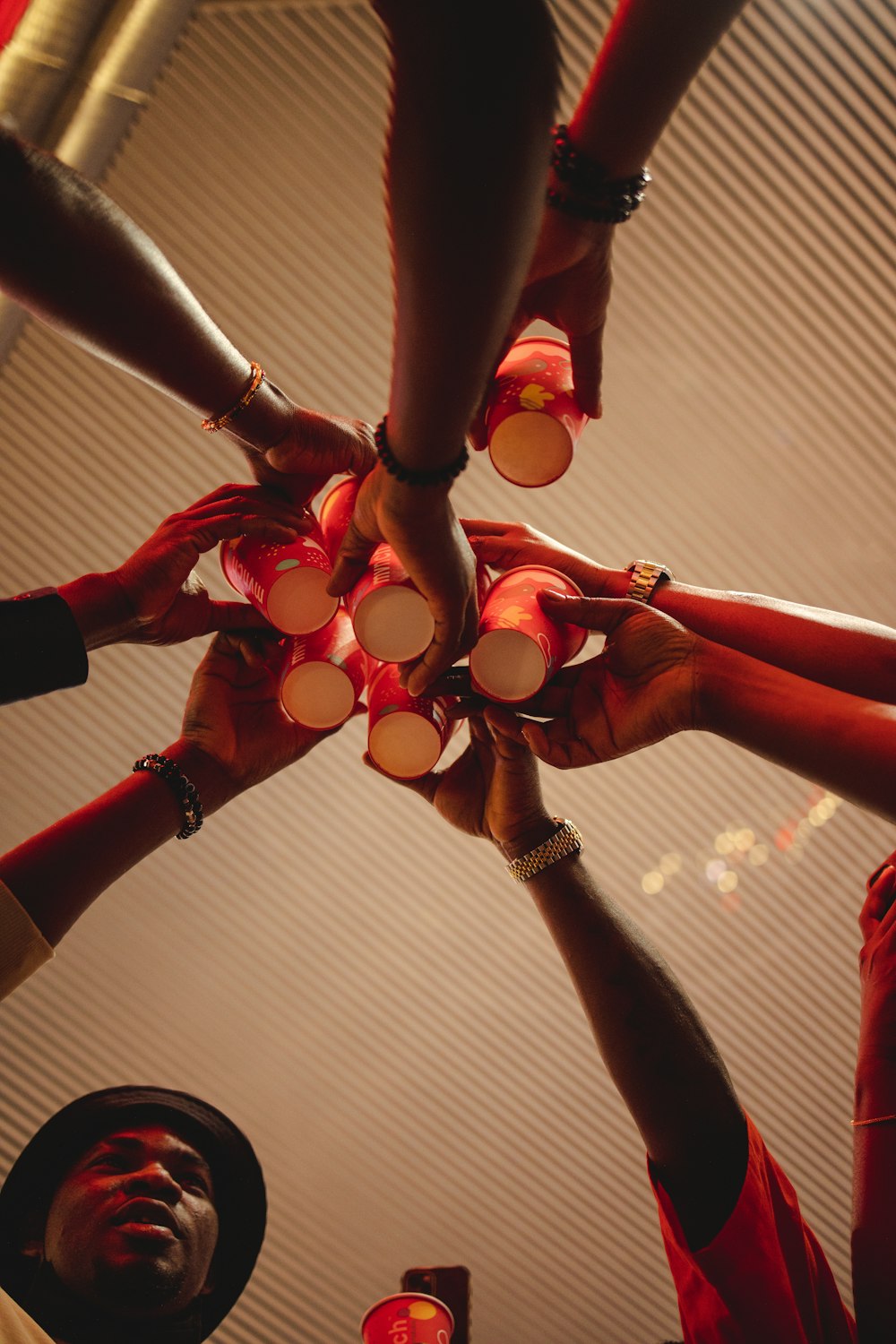 a group of people holding hands