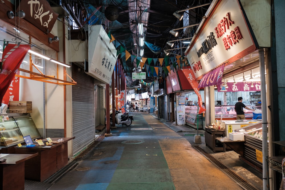 a street with shops and people