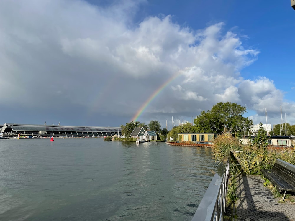 a rainbow over a body of water