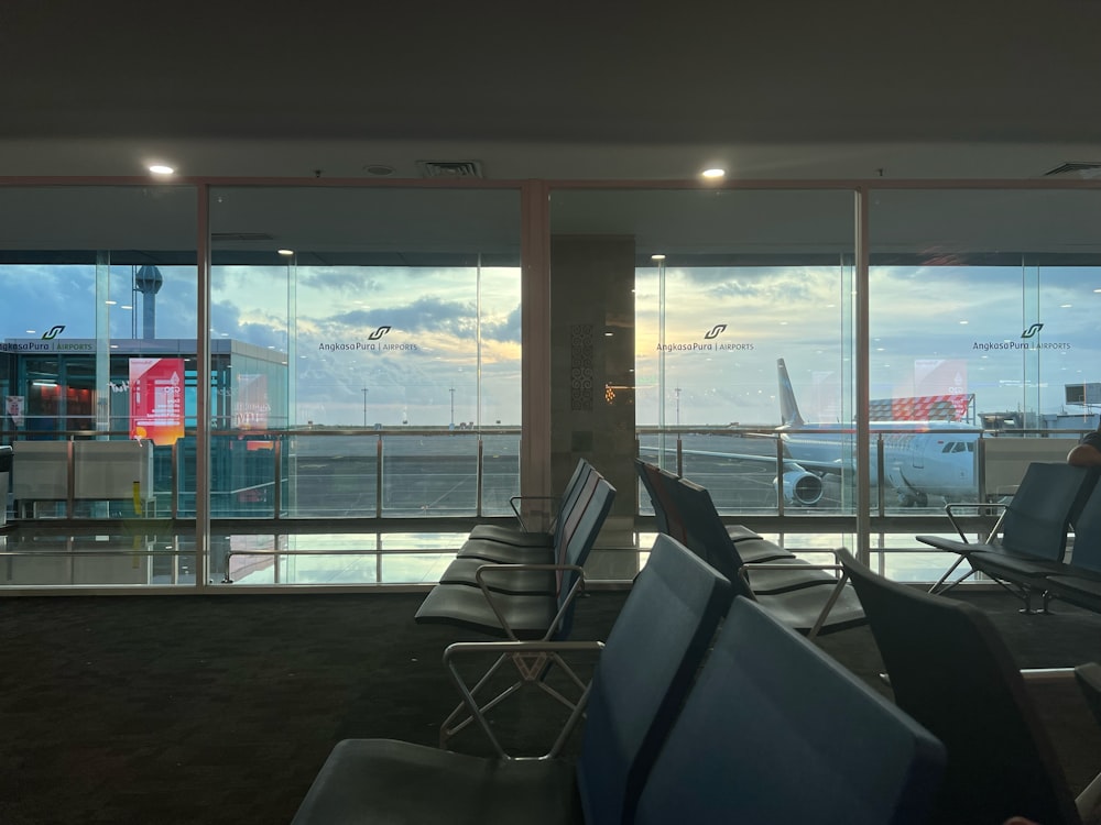 an airport terminal with a large window