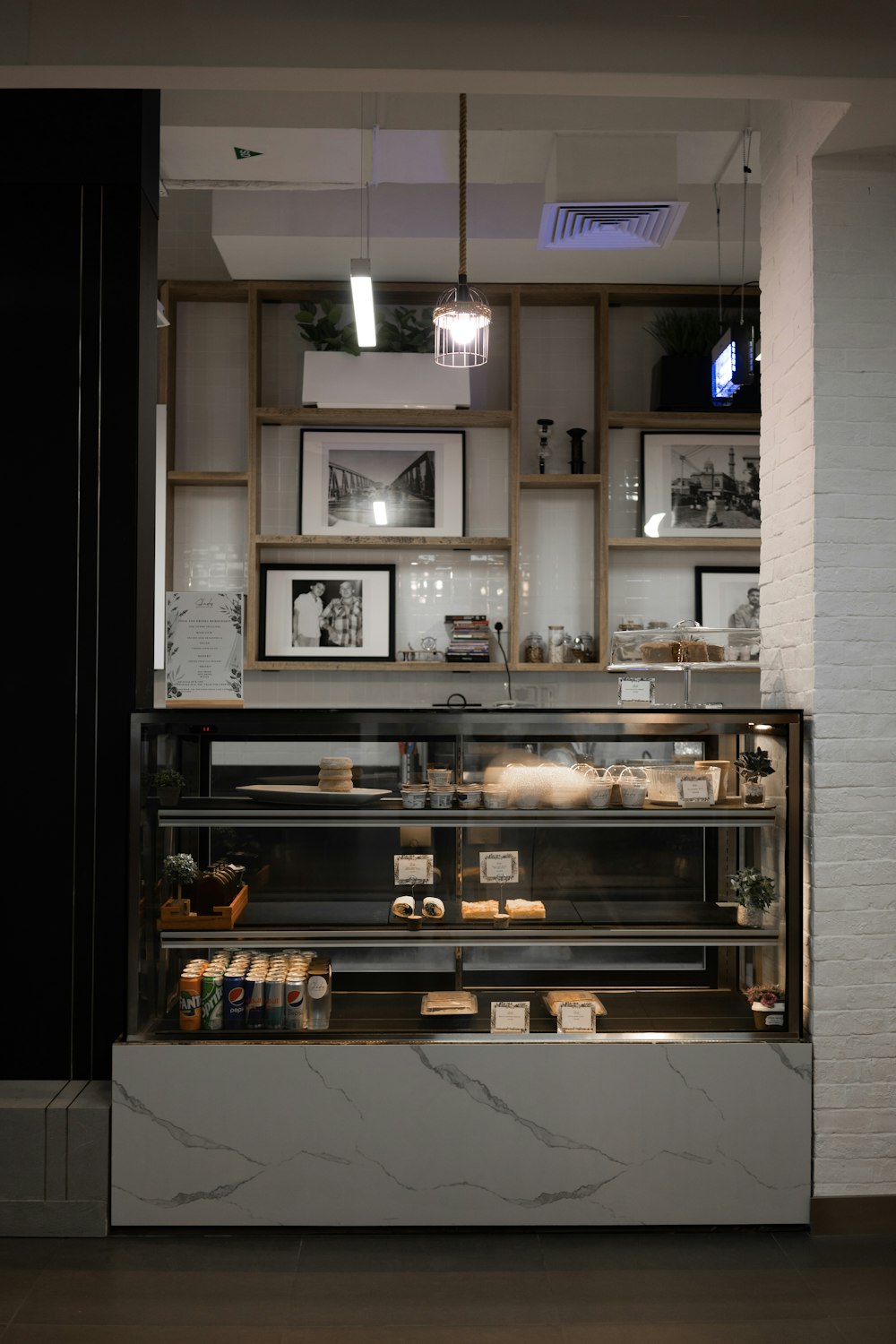 a glass cabinet with objects inside