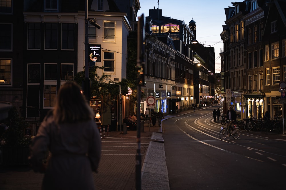 a person walking down a sidewalk