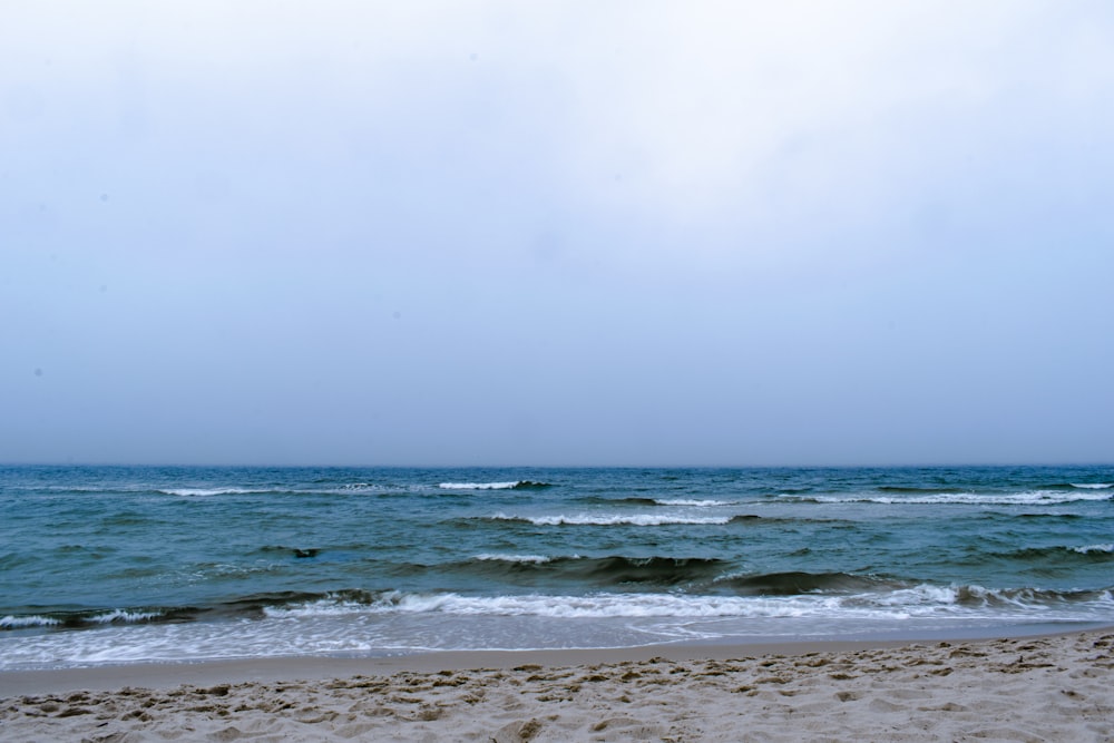 a beach with waves