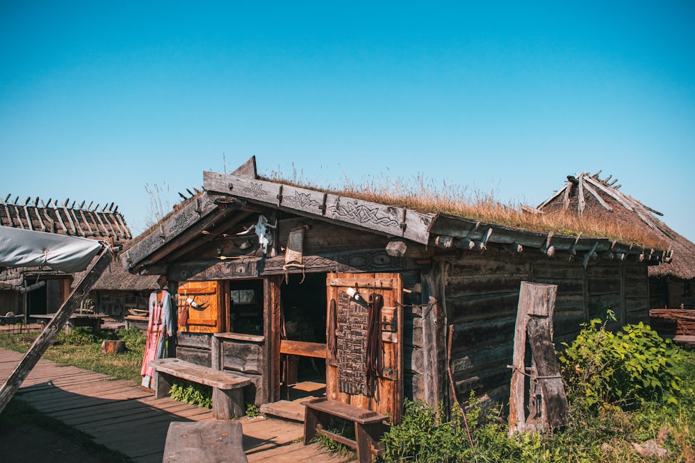 a wooden building with a roof