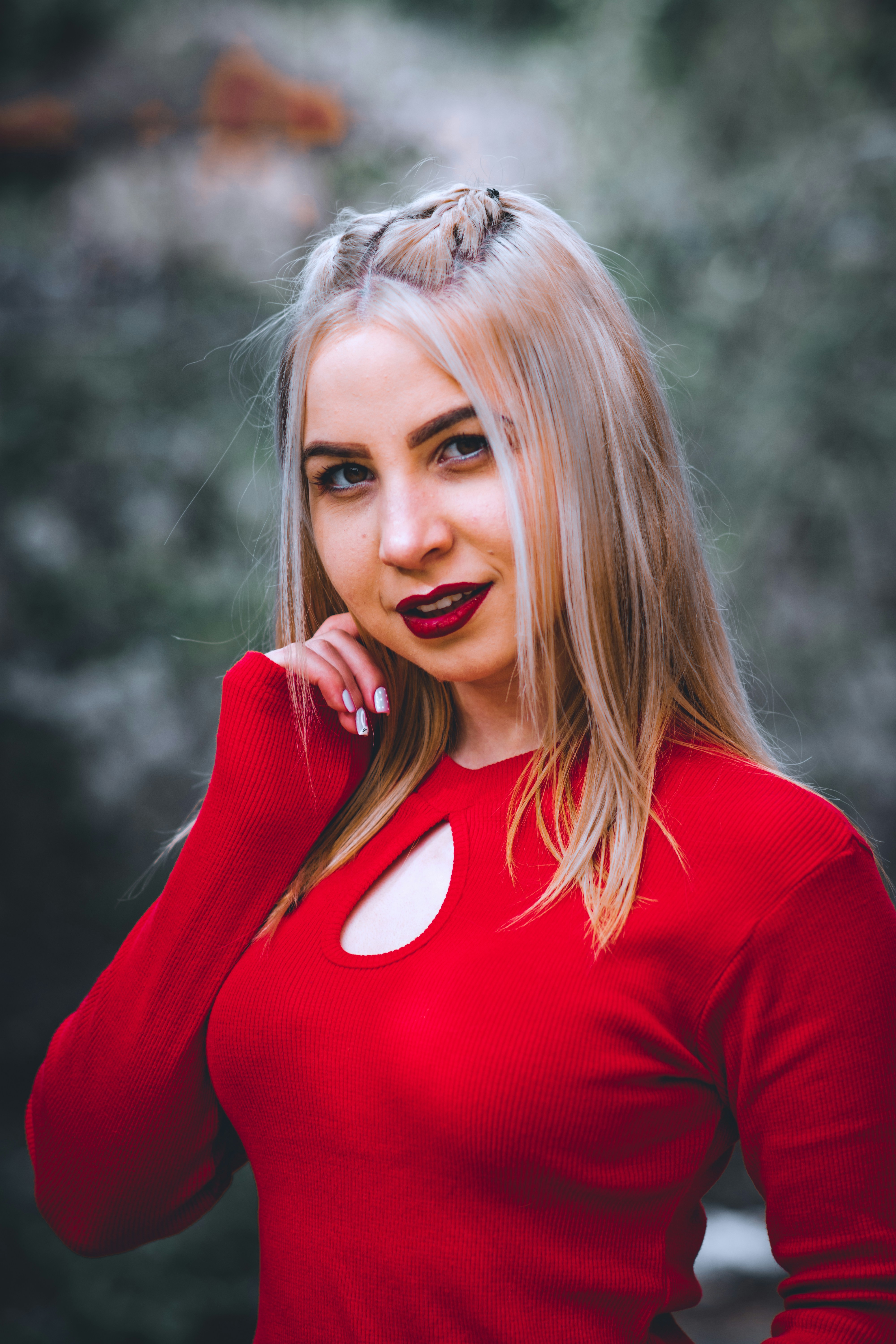 a woman with her hair blowing in the wind