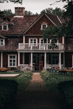 a house with a patio and tables