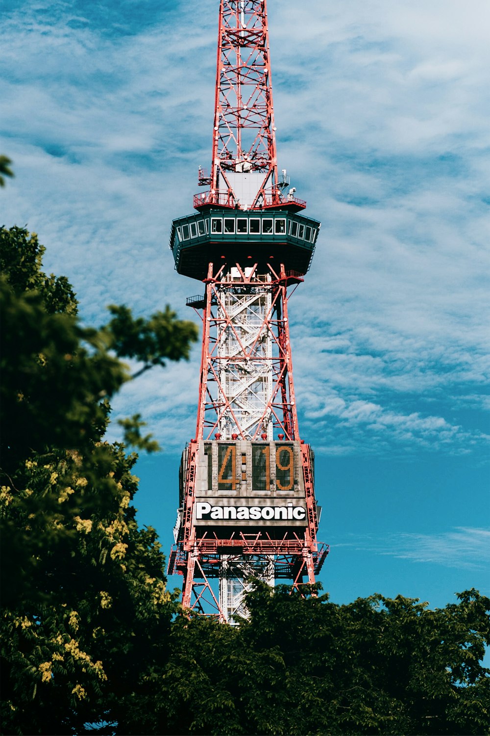 a tall tower with a sign on it