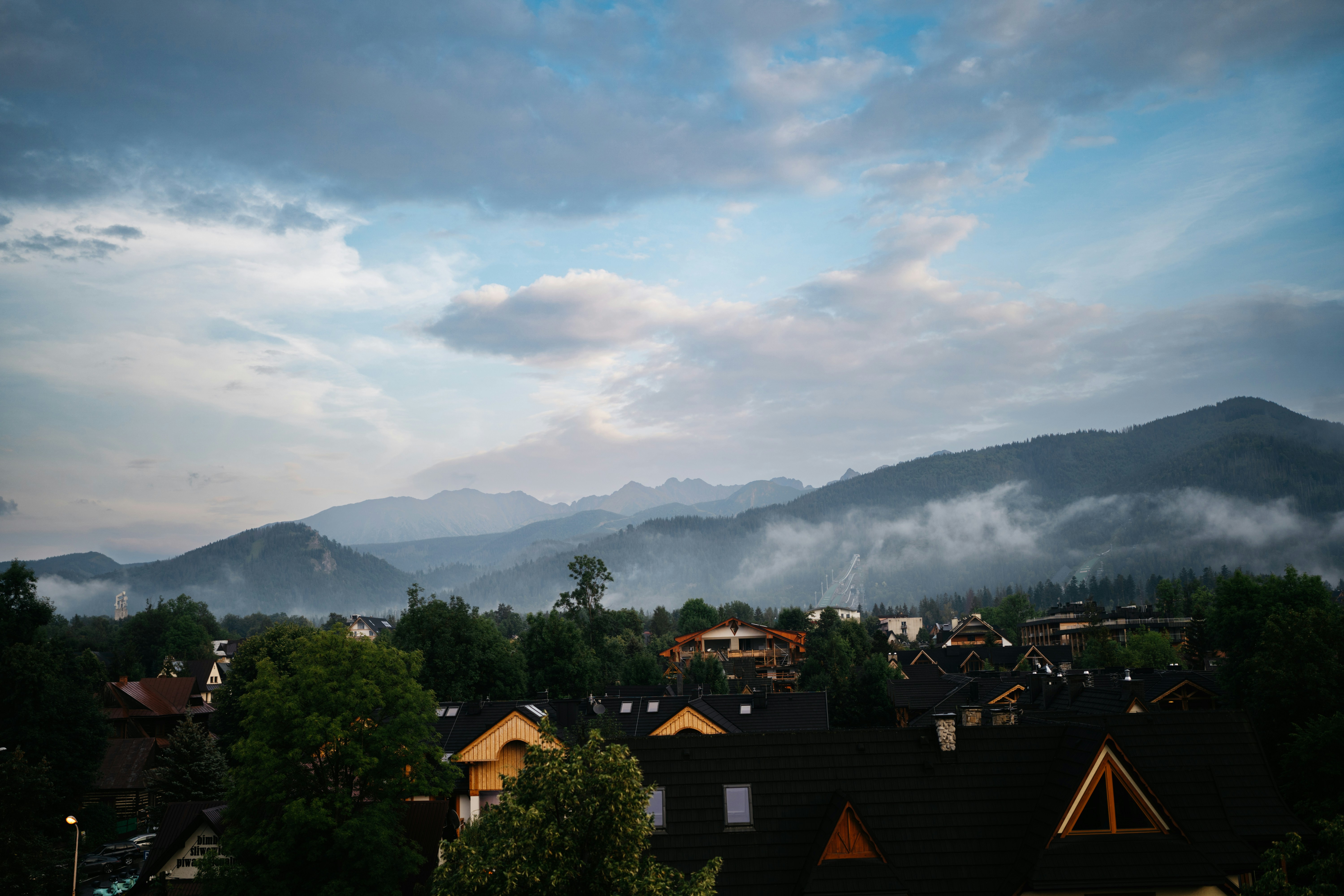 a town with mountains in the background