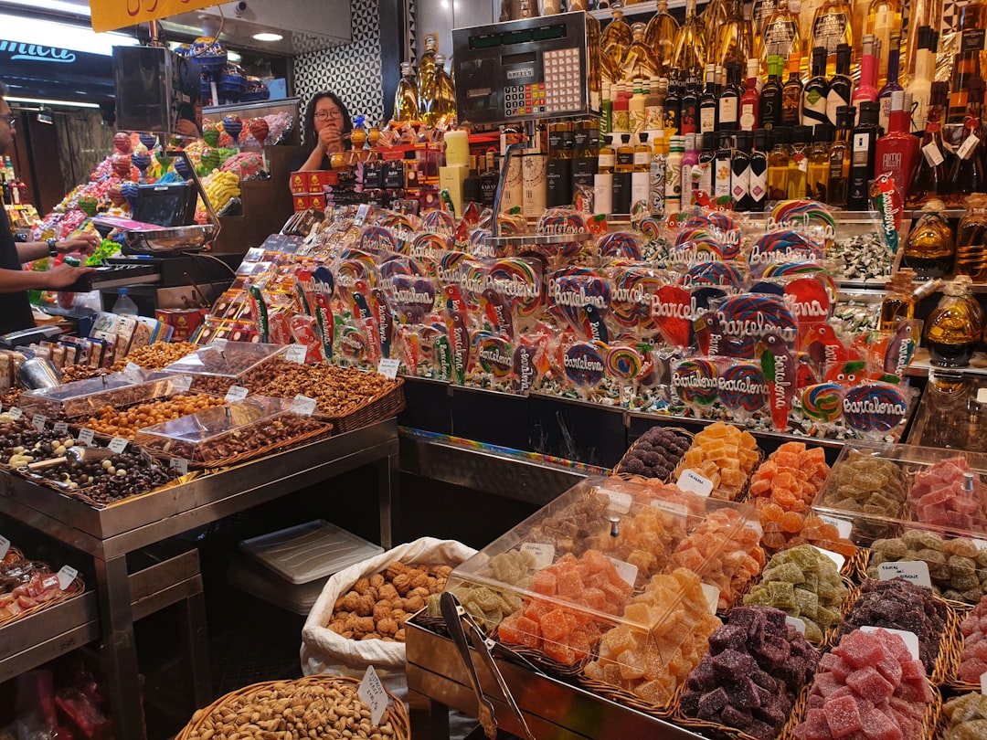 a market with various foods, ➝ Candy stand at the