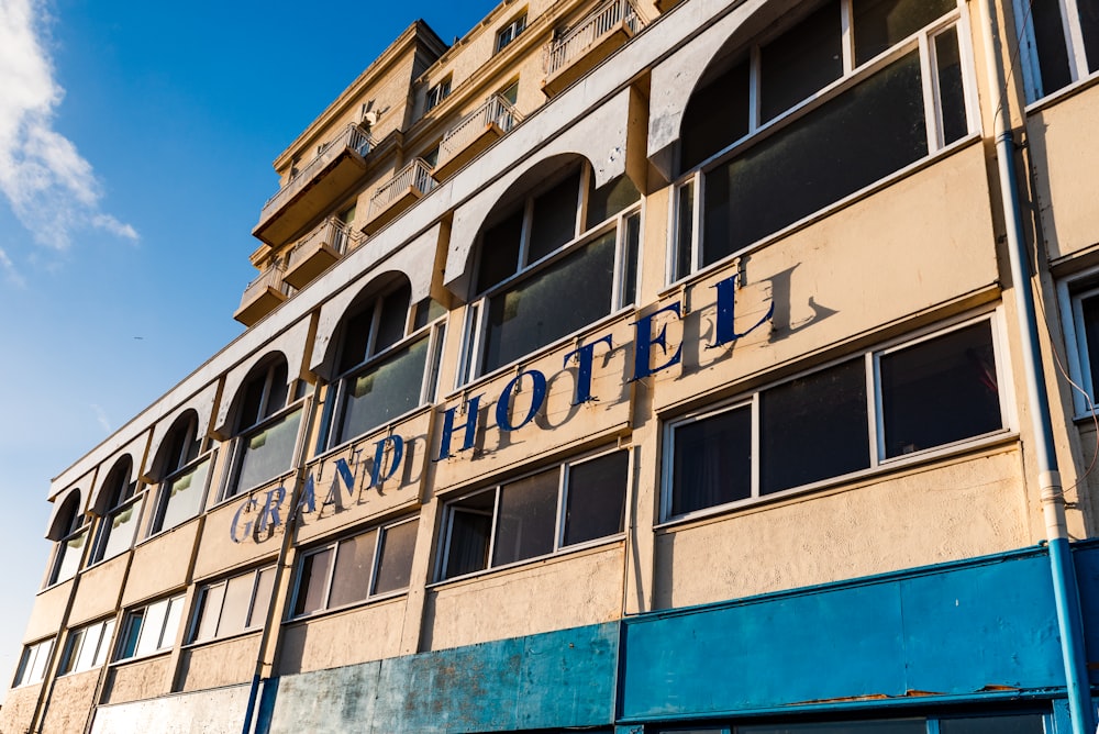 a building with windows and a sign on the side