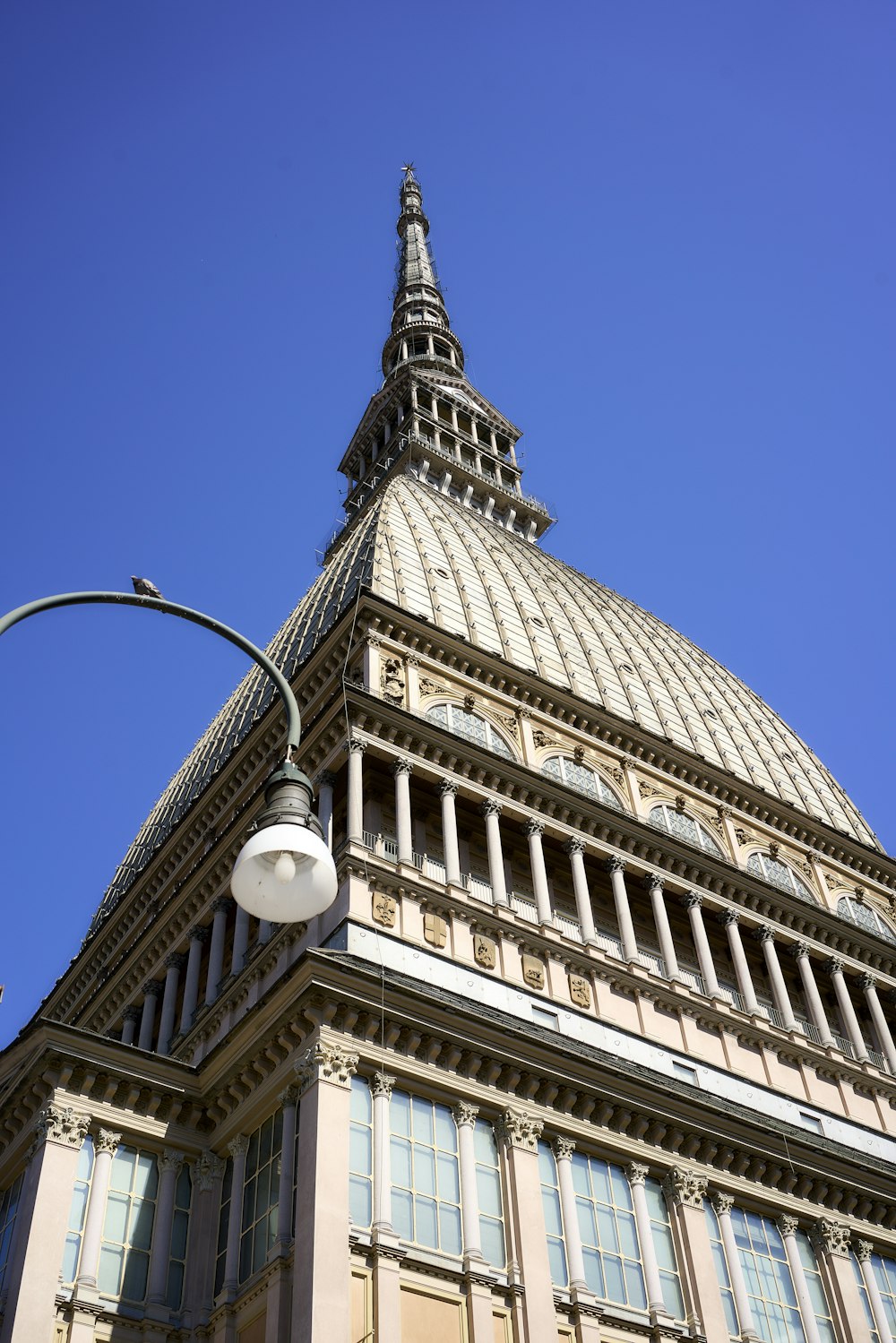 a tall building with Mole Antonelliana