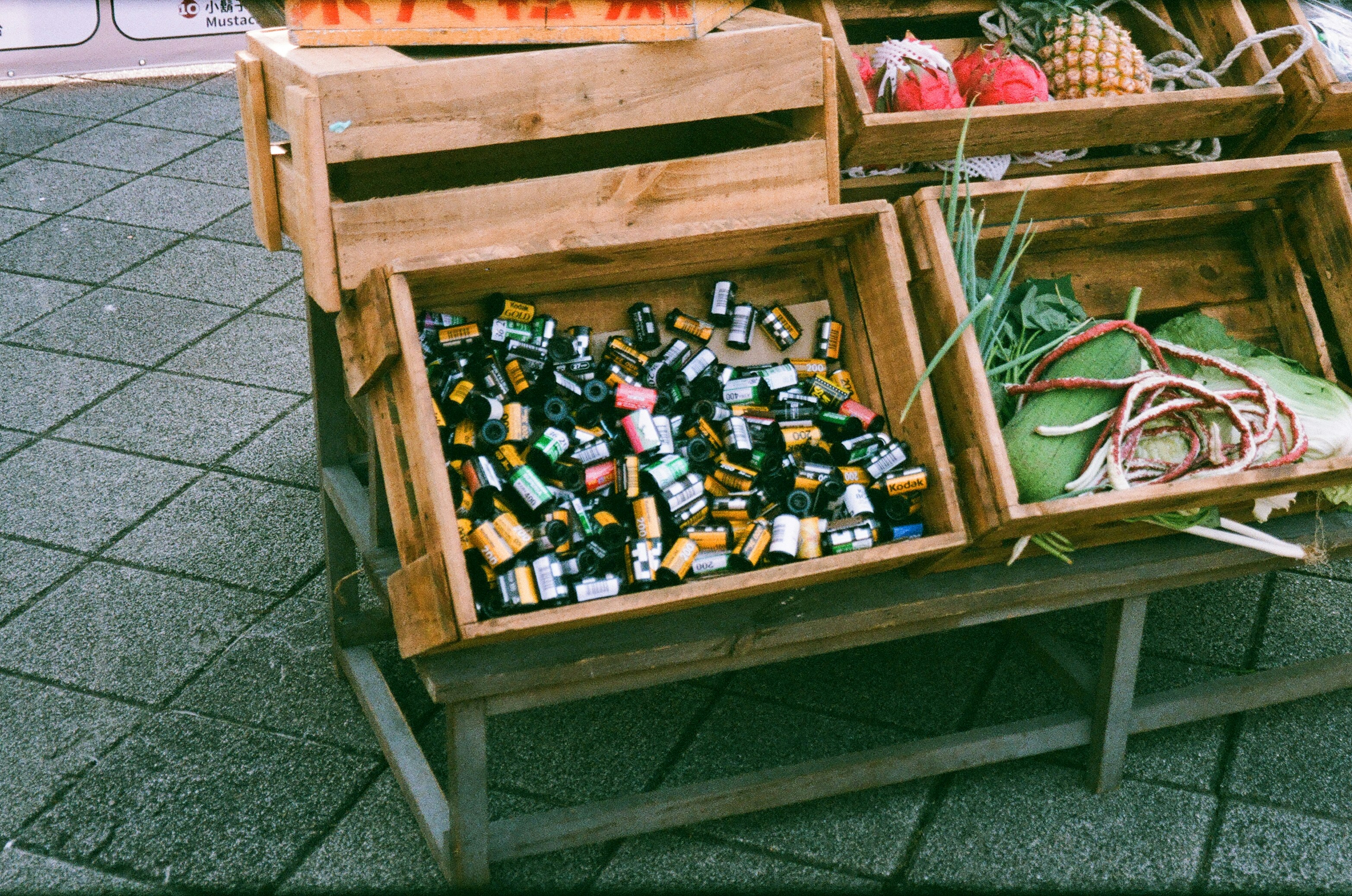a wooden crate with bottles in it