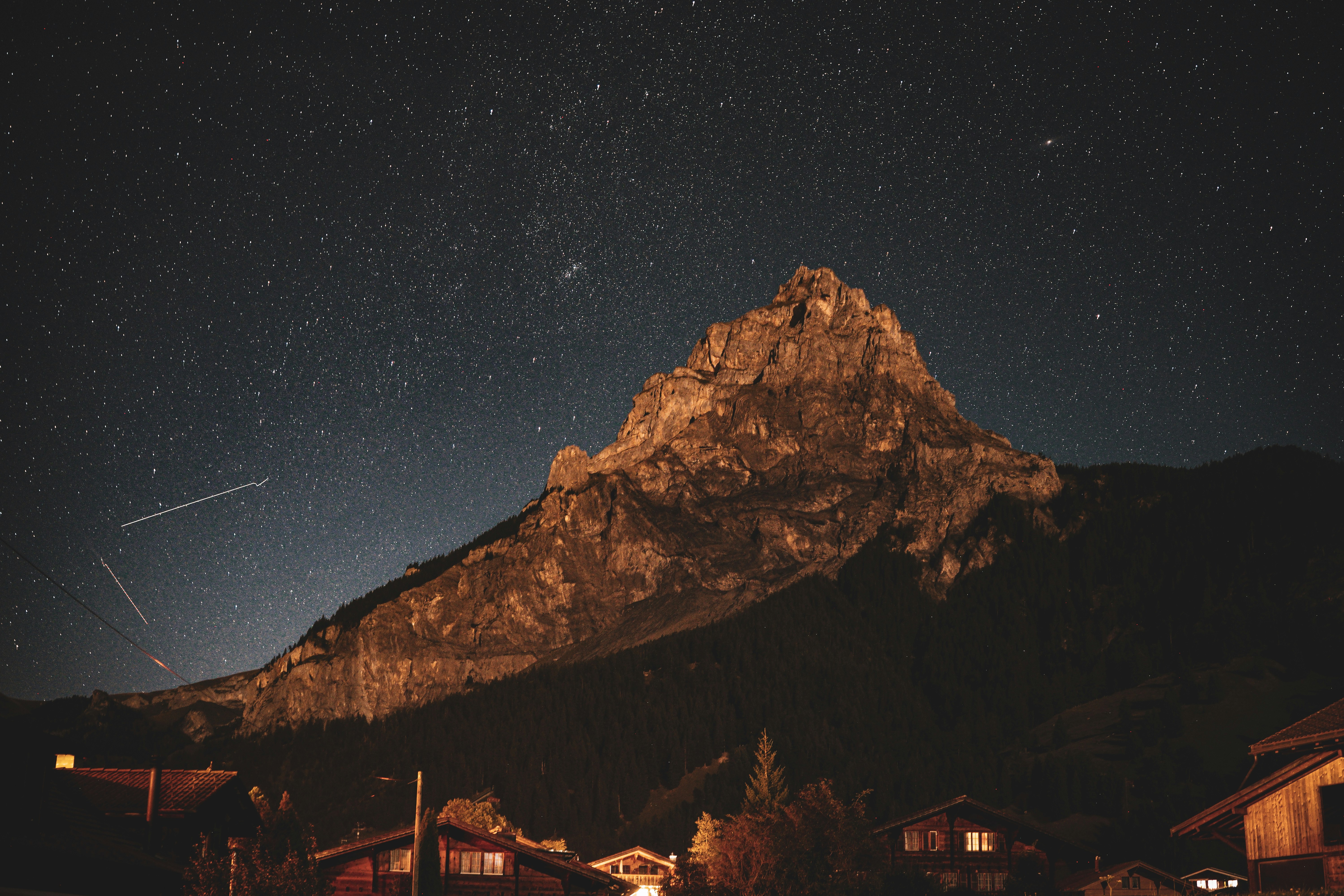 a mountain with a star in the sky