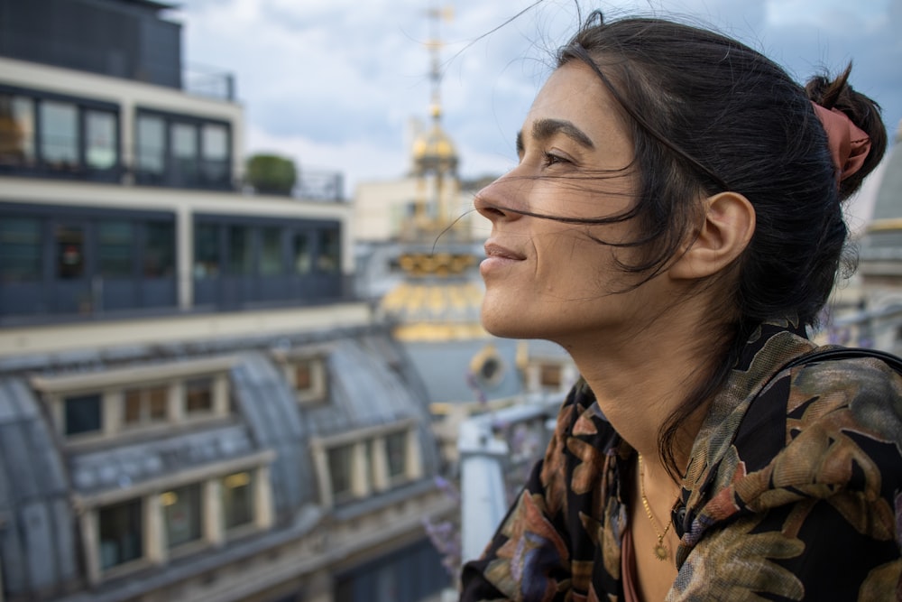 a person looking down at a city