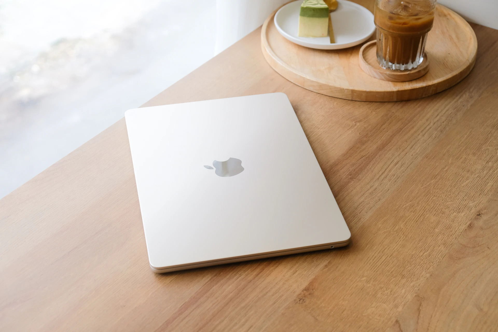 a white laptop on a table