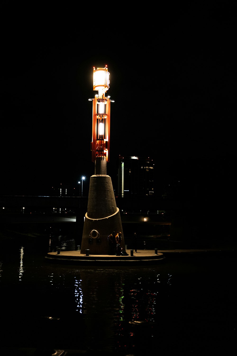 a lit up tower at night